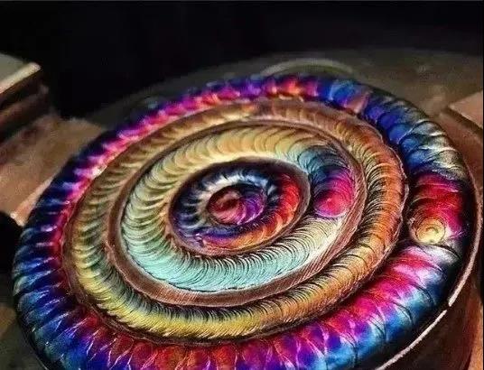 How do you make those fish-scale welds that are so beautiful?